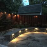 Integrated lighting at seat wall and fence