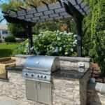 Outdoor kitchen gas Grill built-in under pergola