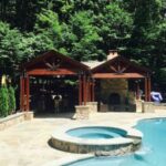 Pool pavilion outdoor kitchen and fireplace